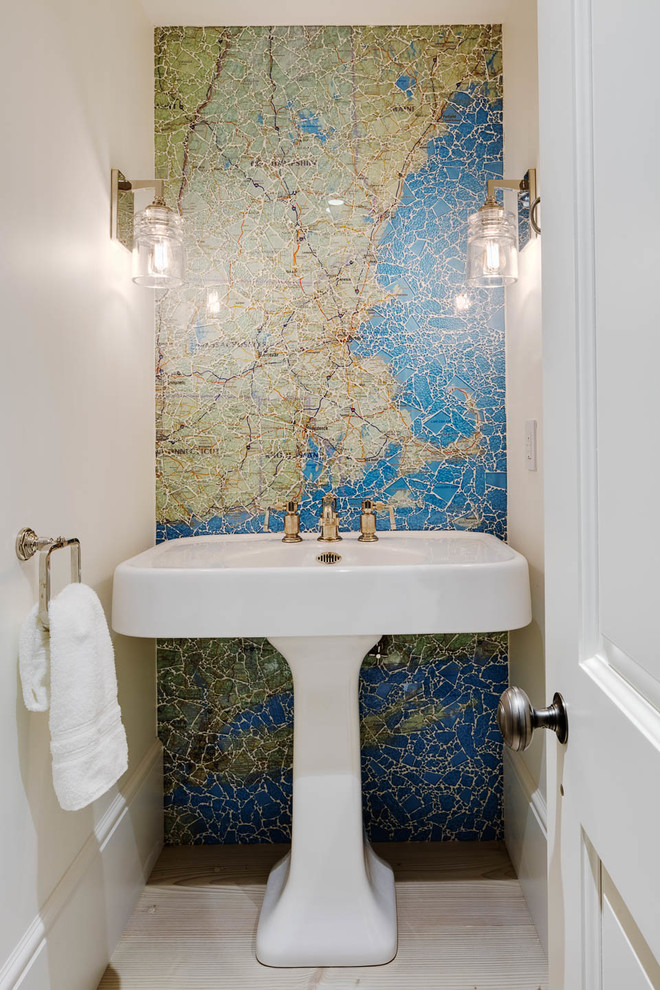 Design ideas for a beach style powder room in Boston with blue tile, green tile, mosaic tile, beige walls, a pedestal sink and beige floor.