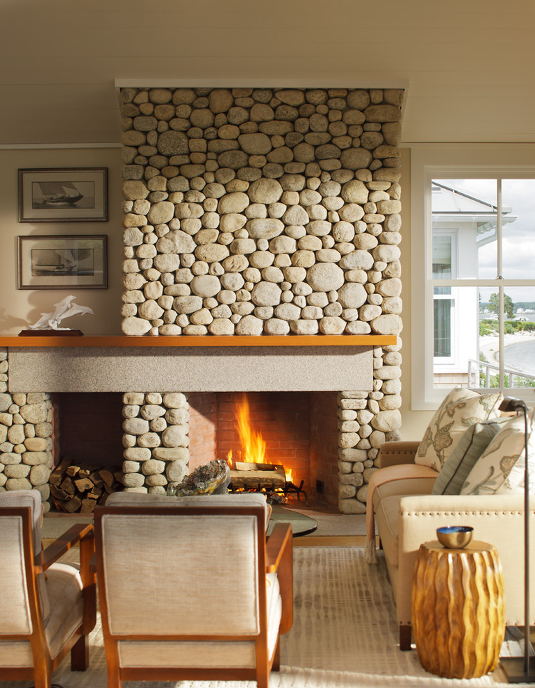 Design ideas for a contemporary living room in Providence with a standard fireplace, a stone fireplace surround and no tv.