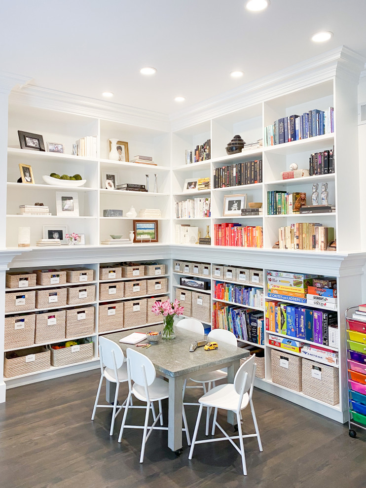 Kids Playroom Organization + Design - Example of a transitional gender-neutral dark wood floor and brown floor playroom design in Chicago with white walls