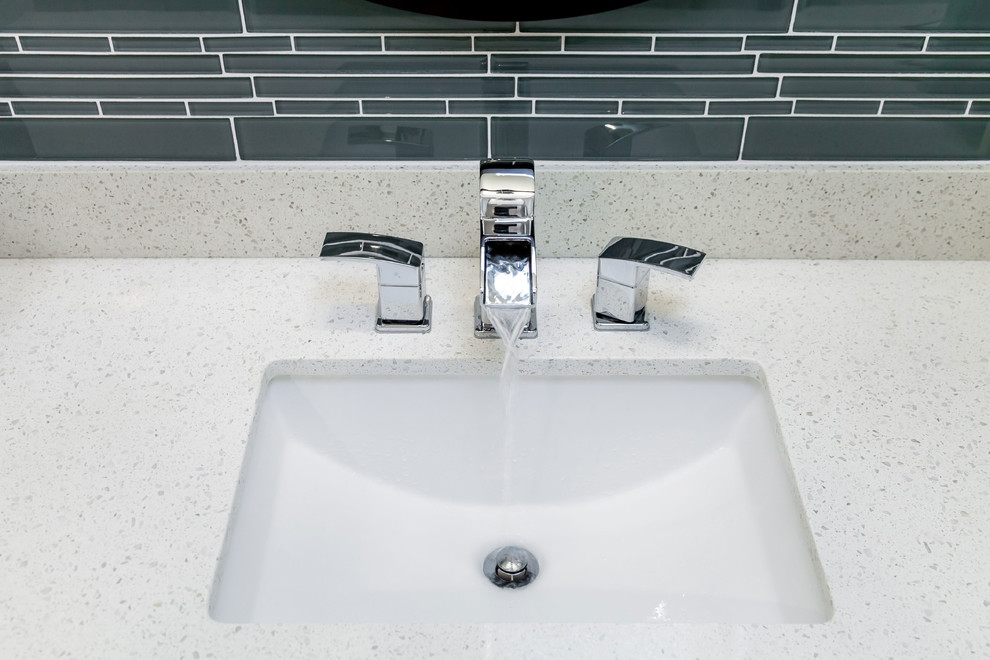 Inspiration for a mid-sized modern kids' gray tile and glass tile porcelain tile alcove shower remodel in Phoenix with recessed-panel cabinets, white cabinets, gray walls, an undermount sink and quartzite countertops