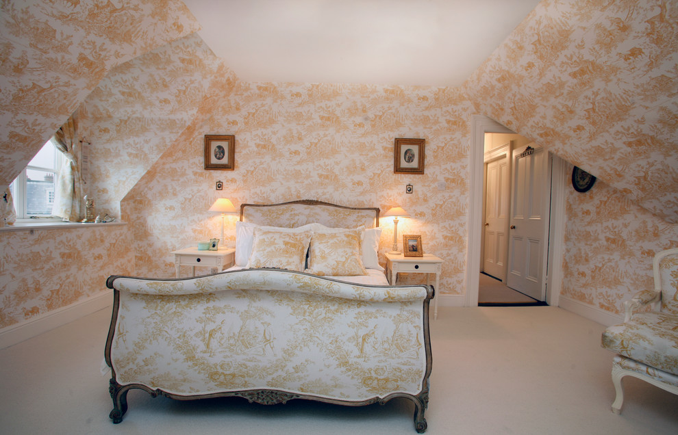Inspiration for a mid-sized traditional master bedroom in Dublin with yellow walls, carpet and white floor.