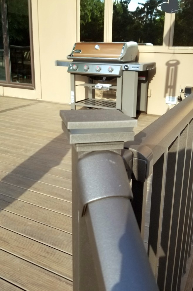 Large backyard deck photo with no cover