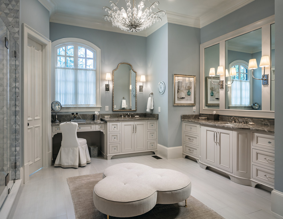 Large transitional master bathroom in Atlanta with beige cabinets, a freestanding tub, a shower/bathtub combo, gray tile, mosaic tile, grey walls, porcelain floors, an undermount sink, quartzite benchtops, beige floor, a hinged shower door and multi-coloured benchtops.