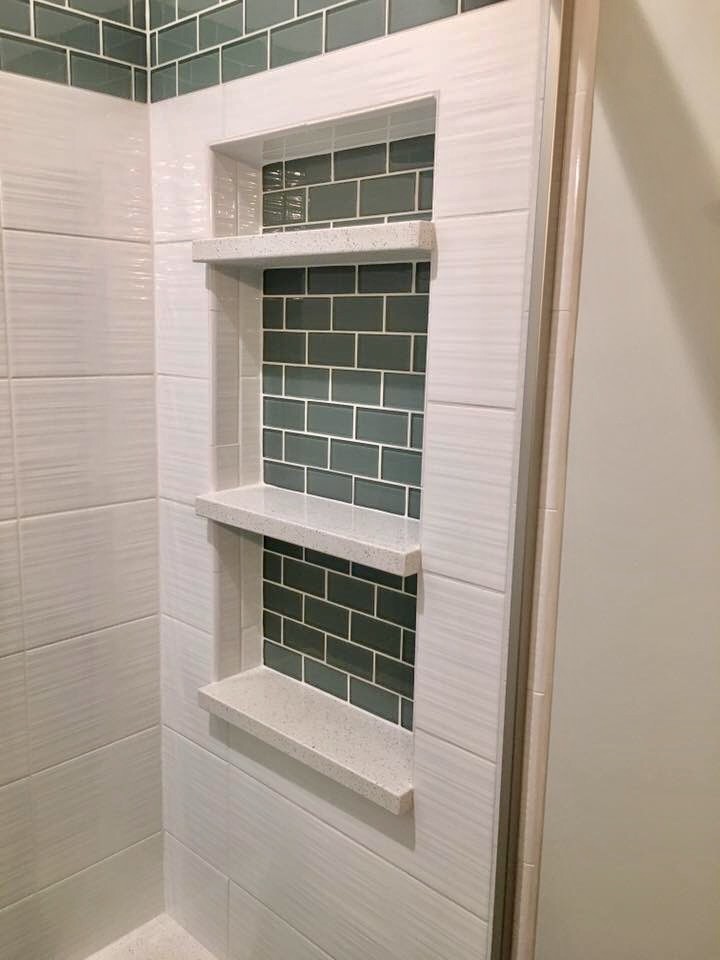 This is an example of a mid-sized contemporary master bathroom in Chicago with louvered cabinets, grey cabinets, an alcove shower, a one-piece toilet, white tile, ceramic tile, grey walls, ceramic floors, an undermount sink, marble benchtops, brown floor and a sliding shower screen.