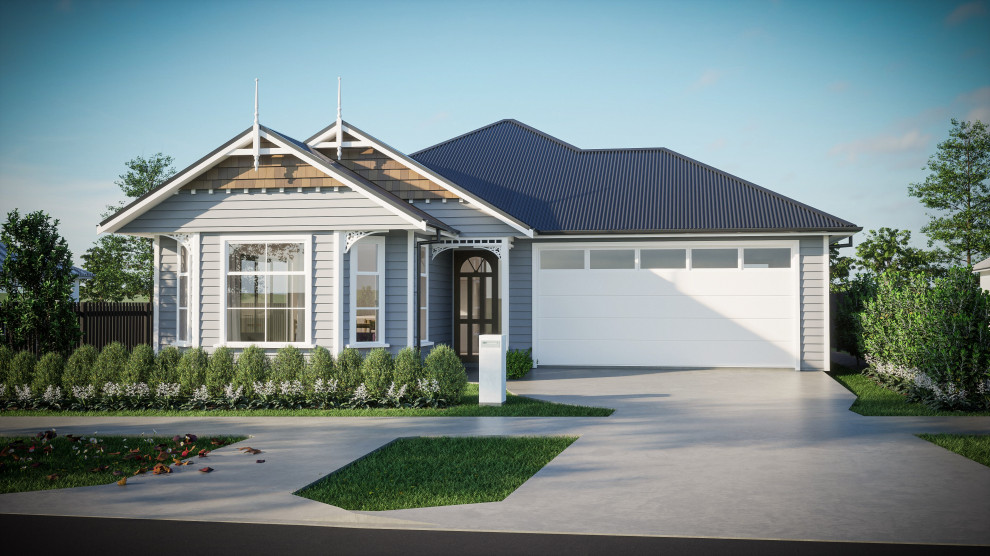 Mid-sized traditional gray one-story wood and clapboard exterior home idea in Auckland with a metal roof and a blue roof