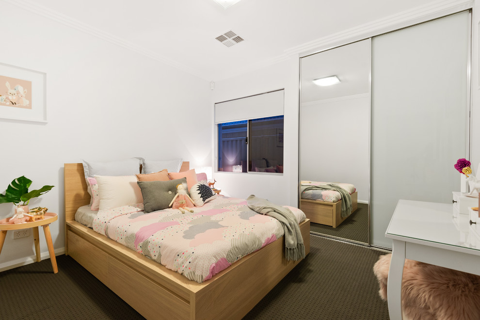 This is an example of a contemporary bedroom in Perth.