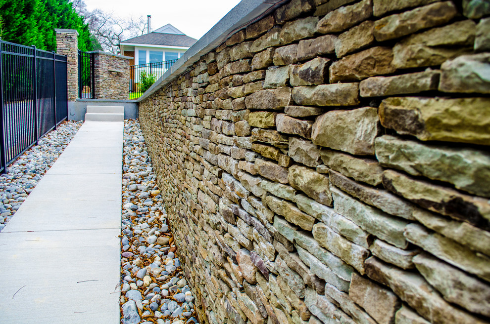 Pool - large transitional backyard concrete paver and rectangular pool idea in DC Metro