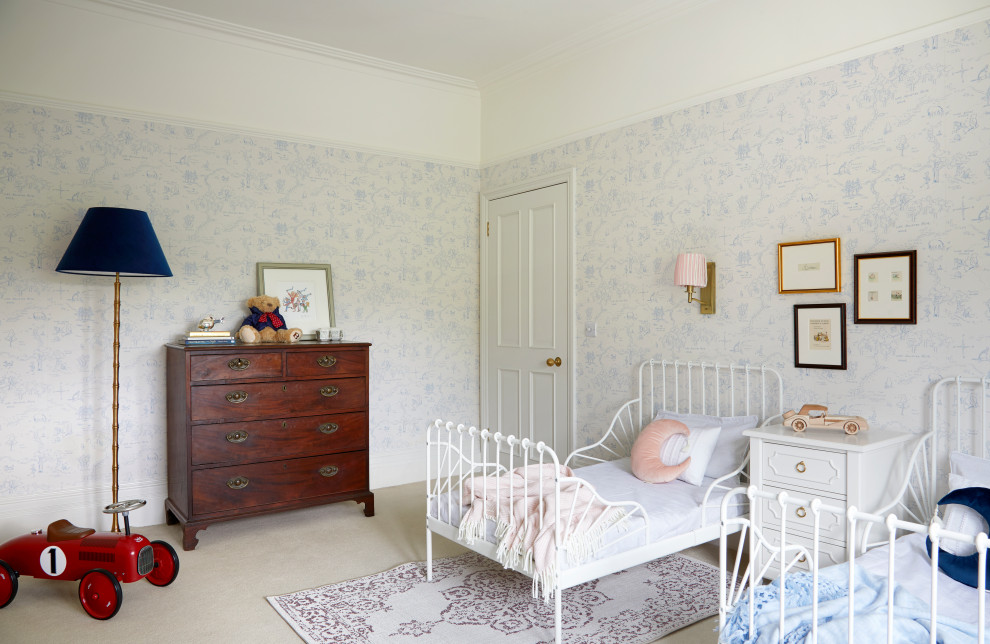Design ideas for a medium sized classic gender neutral toddler’s room in London with blue walls, carpet, beige floors, a coffered ceiling and wallpapered walls.