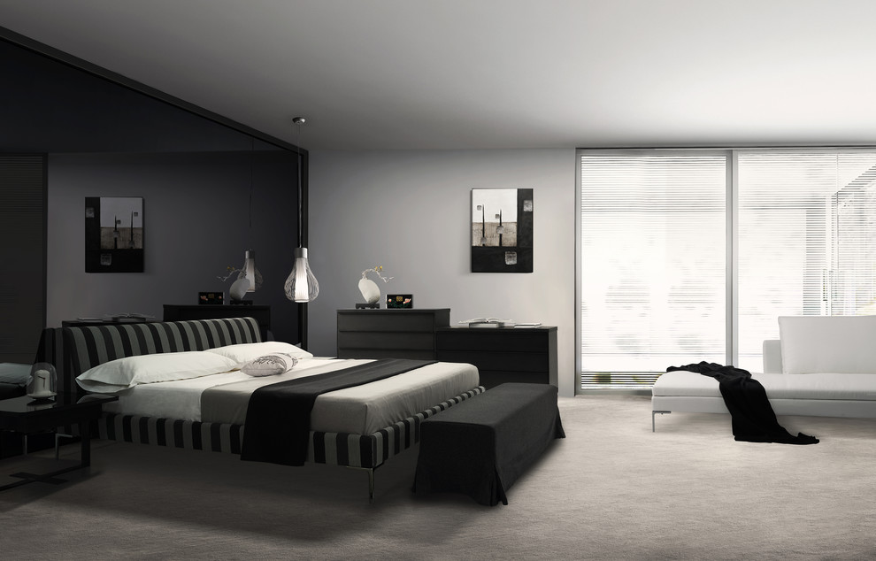 Inspiration for a large modern master bedroom in New York with grey walls, carpet and no fireplace.