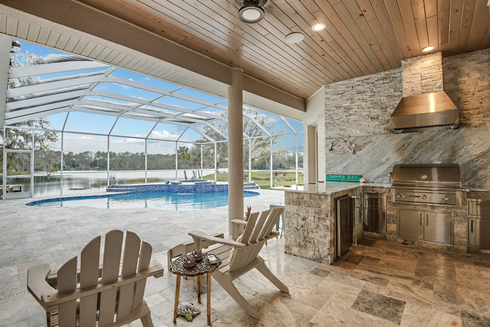 Example of a transitional home design design in Tampa