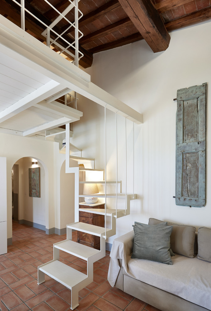 Design ideas for a country staircase in Florence with open risers.