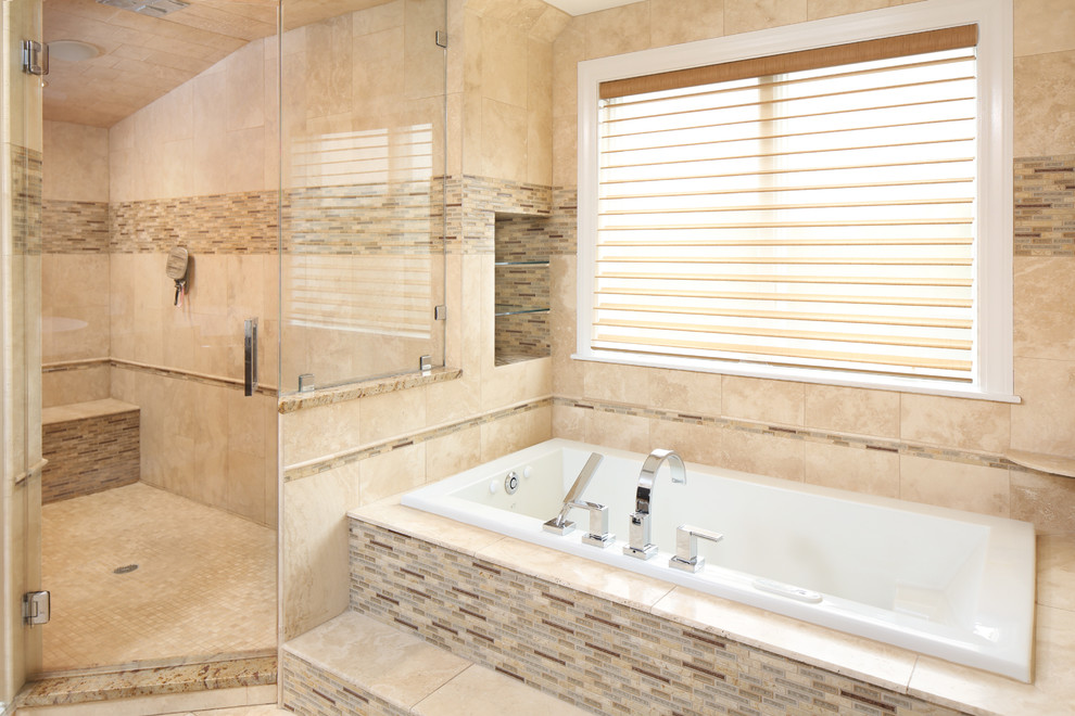Design ideas for an expansive contemporary bathroom in Boston with flat-panel cabinets, dark wood cabinets, an alcove tub, a one-piece toilet, beige tile, stone tile, beige walls, travertine floors, an integrated sink, glass benchtops, with a sauna, a corner shower and a hinged shower door.