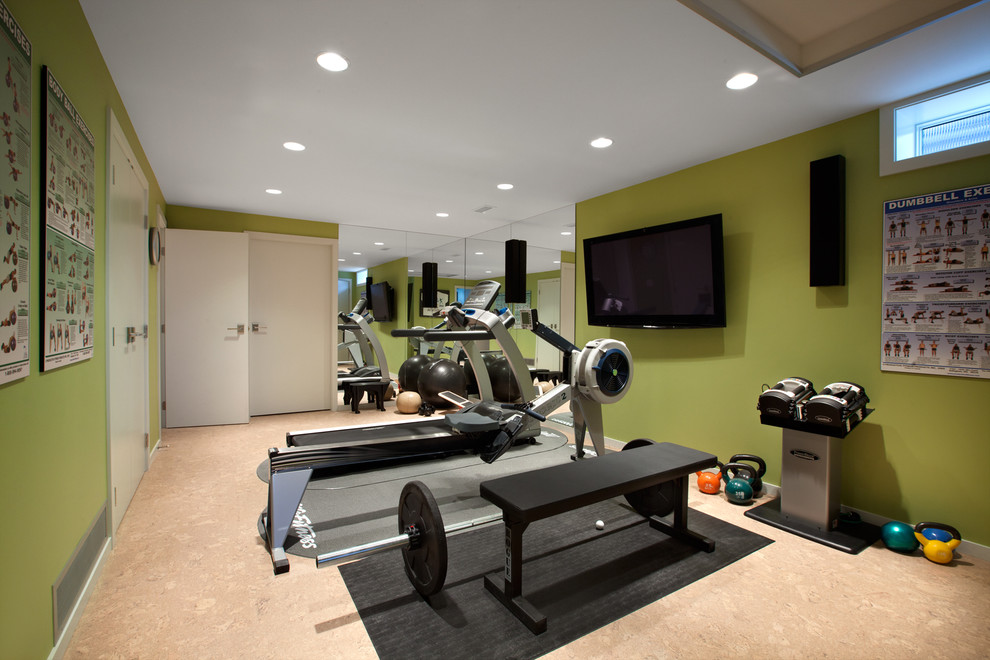 Contemporary home weight room in Vancouver with cork floors and green walls.