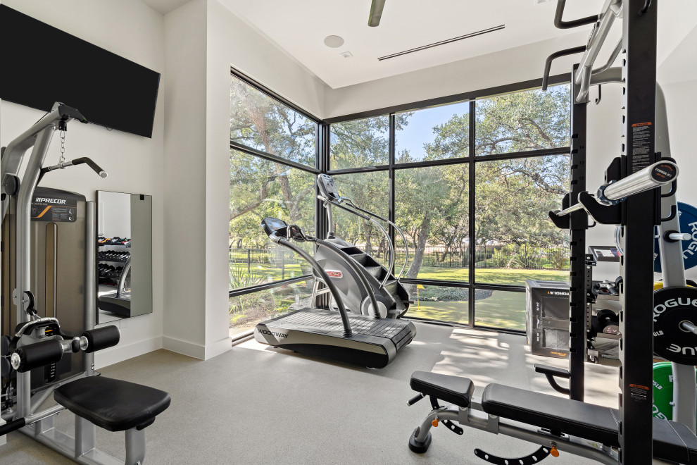 Photo of a contemporary home gym in Austin.