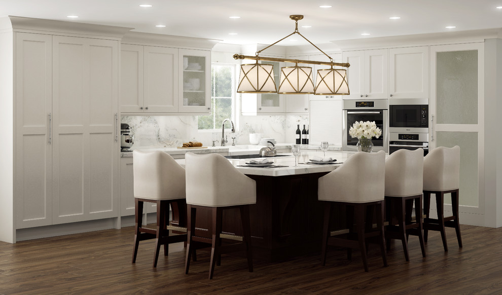 Large transitional l-shaped medium tone wood floor eat-in kitchen photo in Dallas with a farmhouse sink, shaker cabinets, white cabinets, quartzite countertops, white backsplash, stainless steel appliances, an island and stone slab backsplash