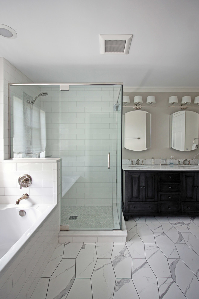 Inspiration for a mid-sized cottage master white tile and subway tile porcelain tile and gray floor bathroom remodel in Chicago with black cabinets, a two-piece toilet, gray walls, an undermount sink, marble countertops and a hinged shower door