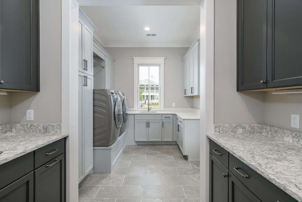 Inspiration for a transitional gray floor hallway remodel with gray walls
