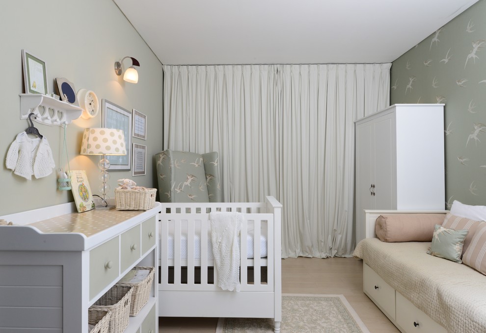 Nursery - transitional girl light wood floor and beige floor nursery idea with gray walls