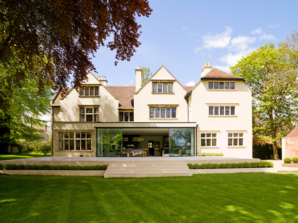 This is an example of a transitional three-storey white exterior in Oxfordshire.