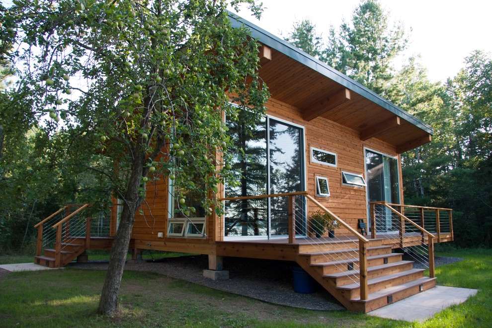 Design ideas for a contemporary exterior in Minneapolis with wood siding.