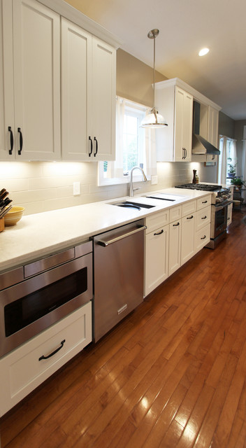 White Kitchen With Quartz Countertop Galley Workstation And Large