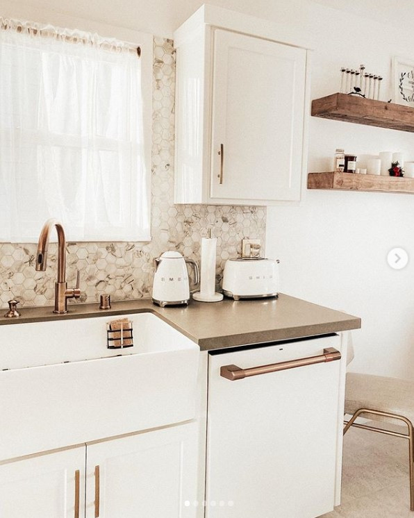 Eat-in kitchen - mid-sized transitional ceramic tile and beige floor eat-in kitchen idea in San Francisco with a farmhouse sink, shaker cabinets, white cabinets, quartz countertops, multicolored backsplash, mosaic tile backsplash, white appliances and gray countertops