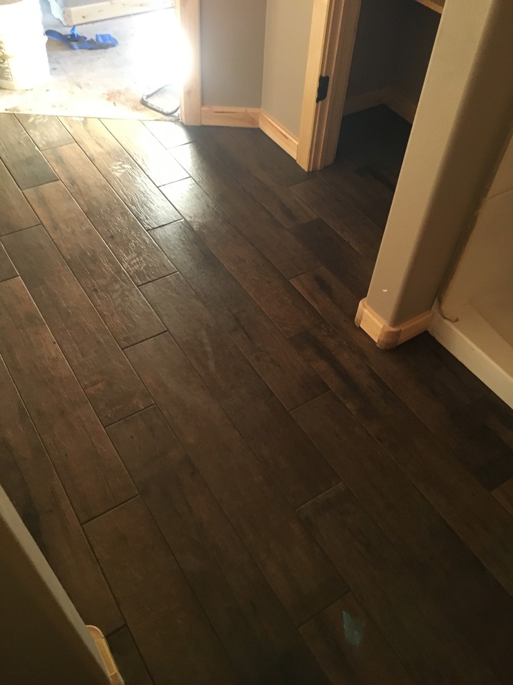 Mid-sized mountain style master brown tile and porcelain tile porcelain tile home design photo
