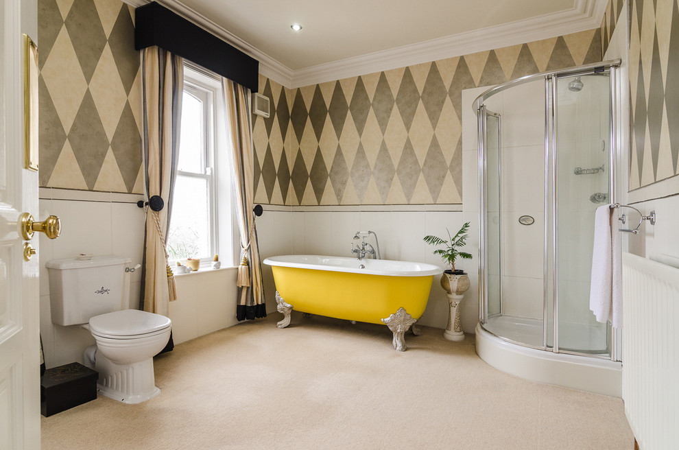 Inspiration for a traditional master bathroom in Belfast with a claw-foot tub, a corner shower, a two-piece toilet, white tile and multi-coloured walls.