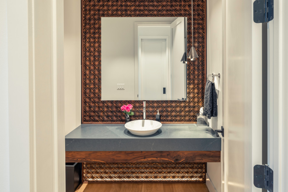 Design ideas for a modern powder room in Other.