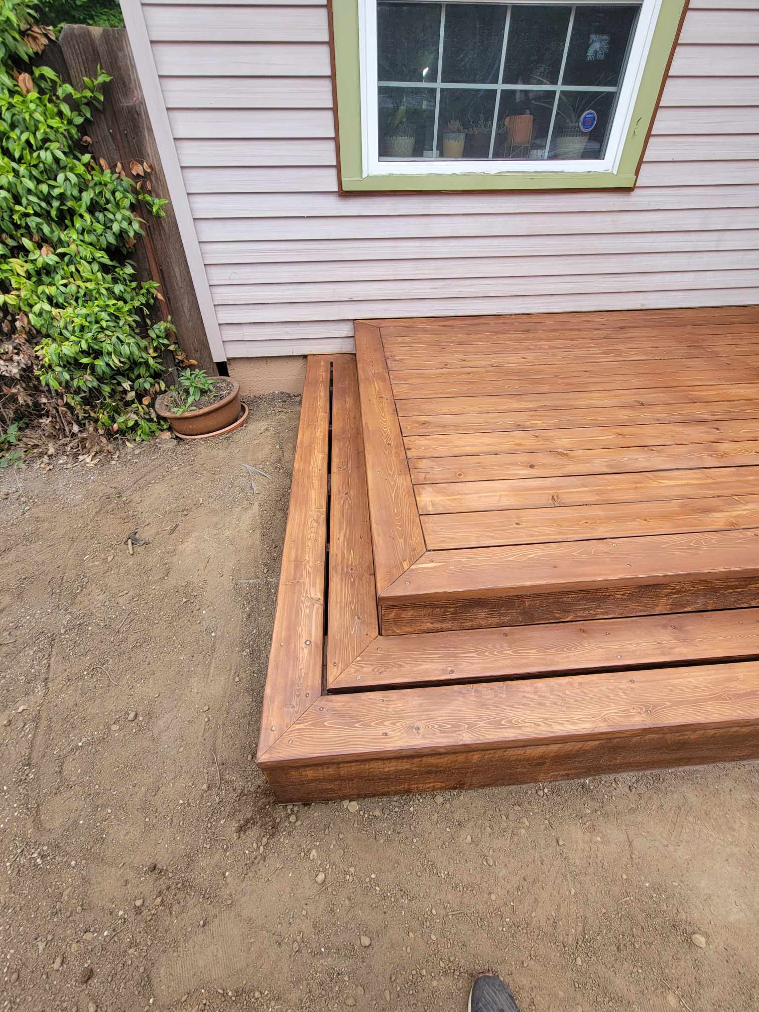 Tight knot cedar deck with rusticana stain