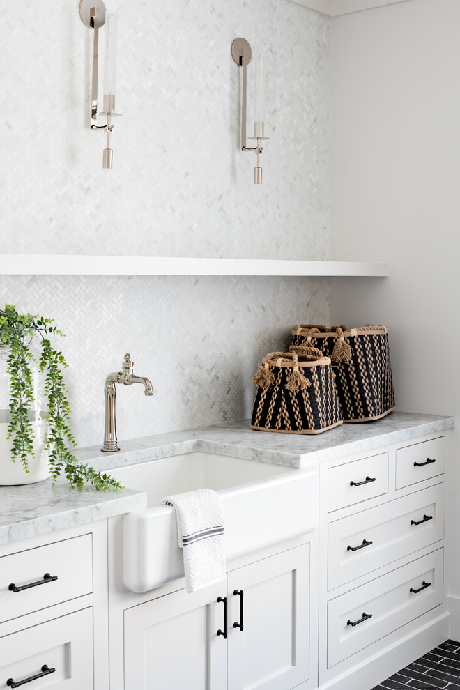 Example of a transitional laundry room design in Phoenix