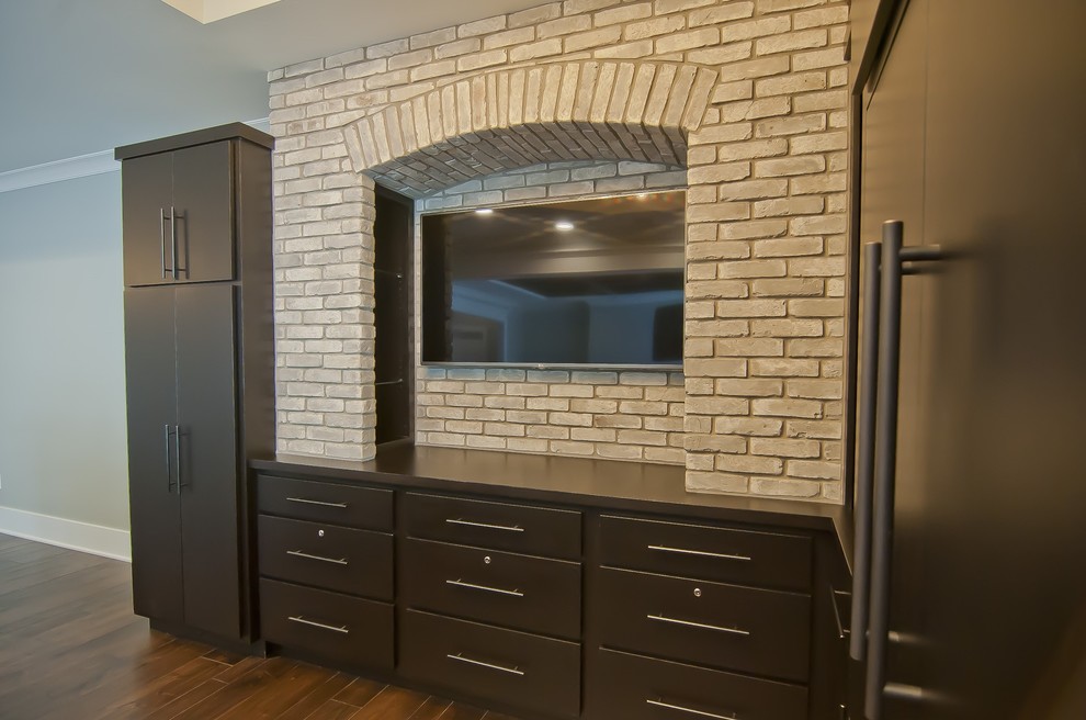 Transitional home design photo with quartz countertops