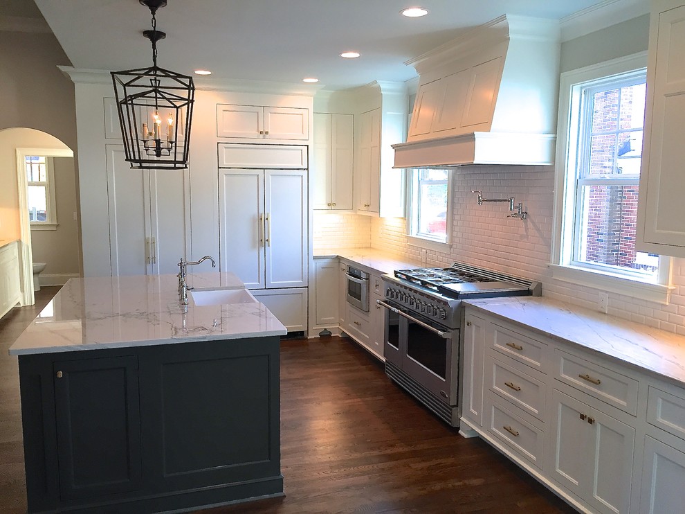 Kitchen - large transitional l-shaped kitchen idea
