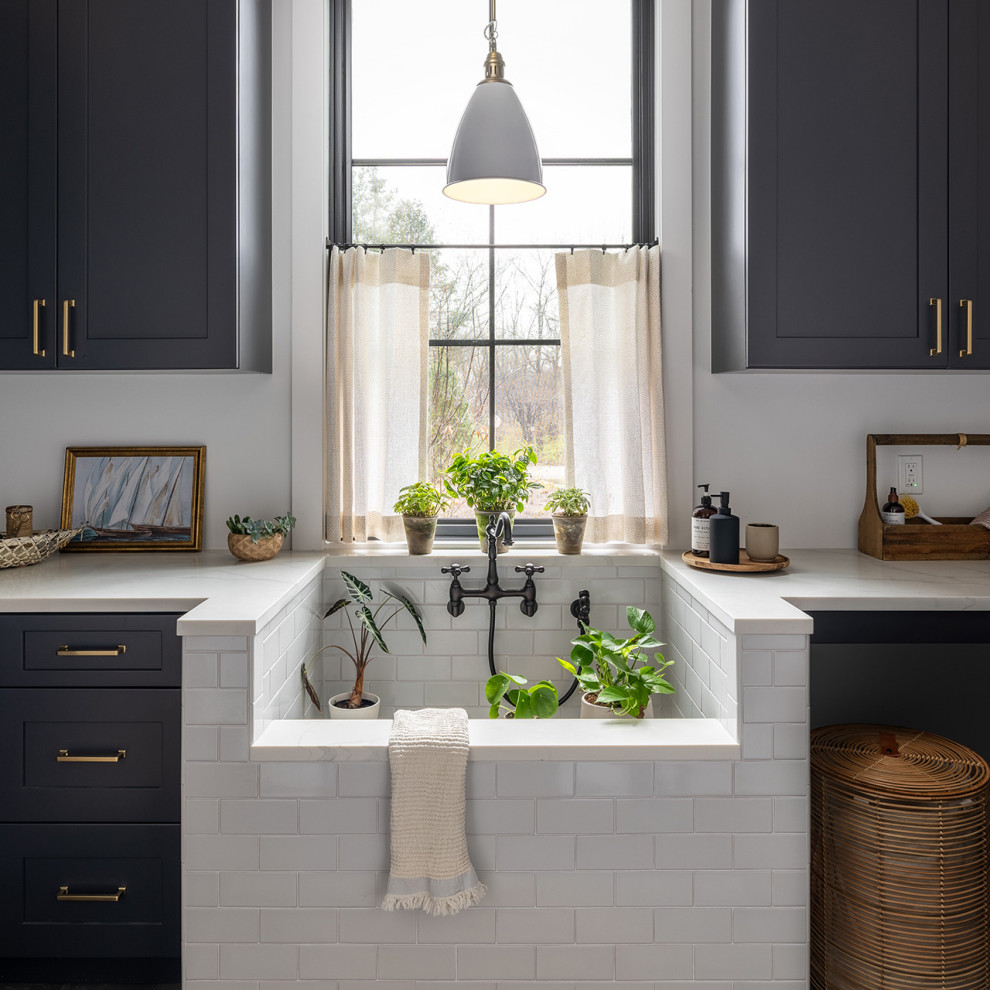 Beach style laundry room photo