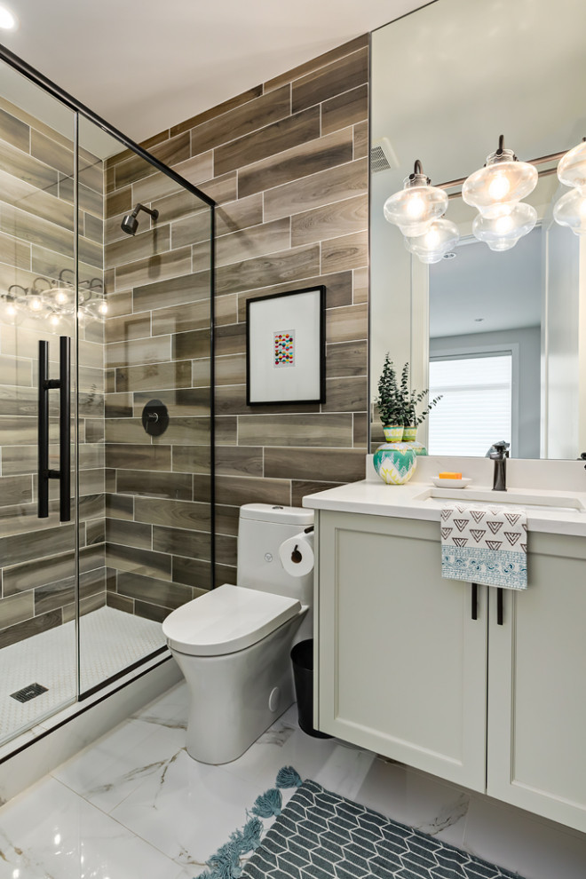 Contemporary bathroom in Calgary with shaker cabinets, green cabinets, a freestanding tub, a one-piece toilet, white tile, wood-look tile, white walls, porcelain floors, an undermount sink, engineered quartz benchtops, grey floor, white benchtops, a niche, a single vanity and a built-in vanity.