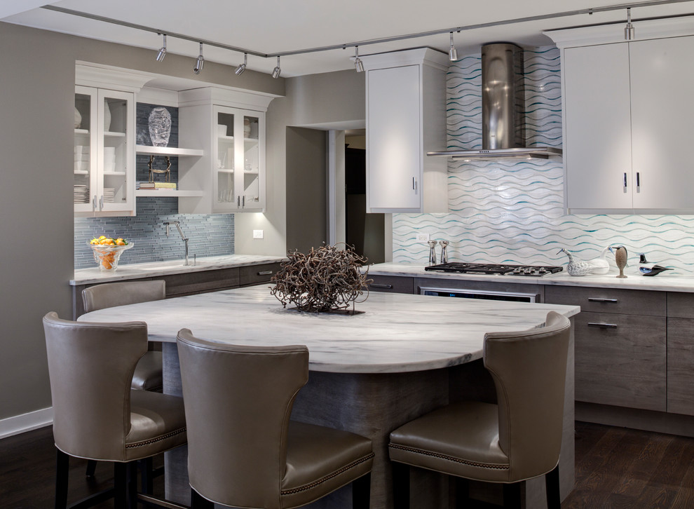 Photo of a contemporary l-shaped separate kitchen in Chicago with an undermount sink, glass-front cabinets, white cabinets, multi-coloured splashback, dark hardwood floors and with island.