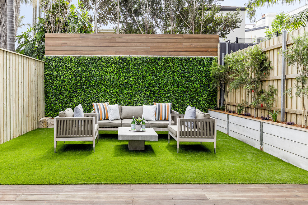Design ideas for a contemporary backyard deck in Sydney with no cover.