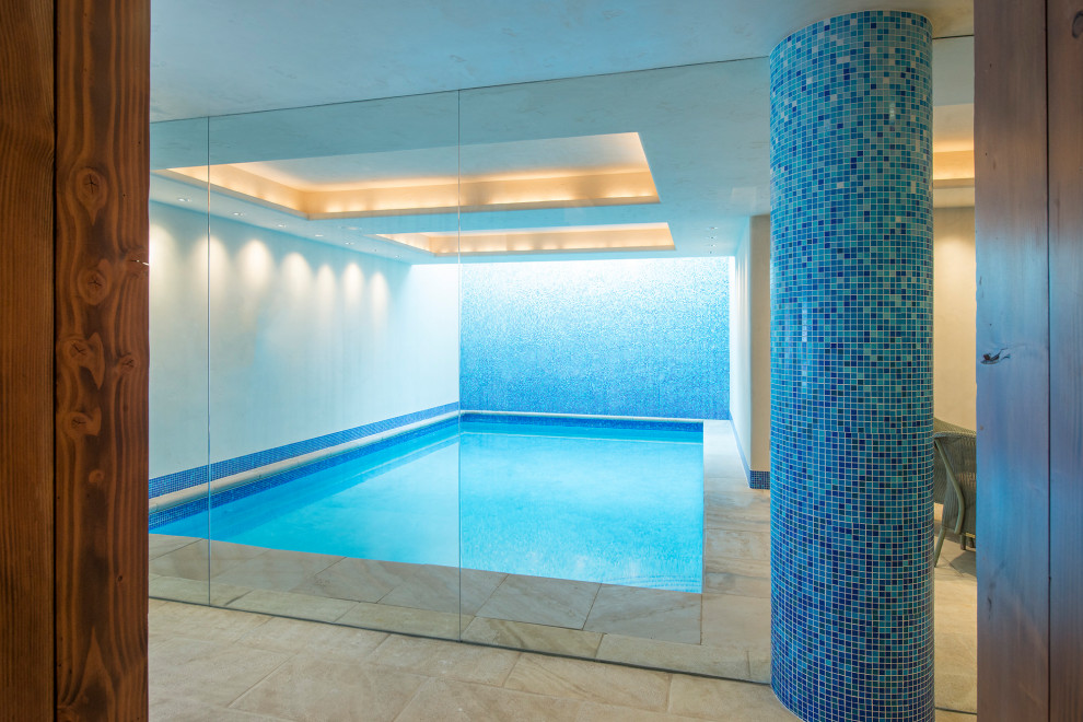 Mid-sized contemporary indoor rectangular lap pool in Denver with tile.