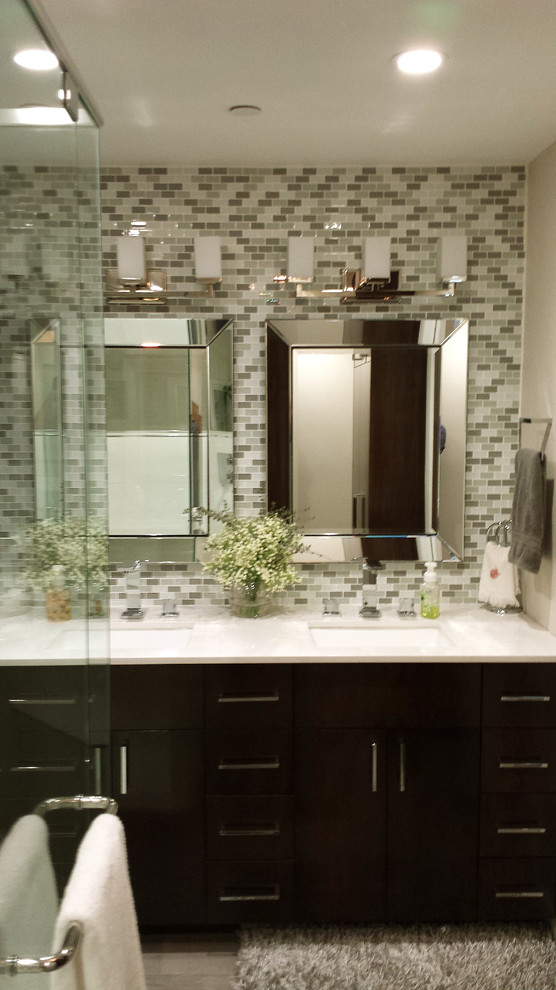 Mid-sized contemporary master bathroom in Los Angeles with an undermount sink, flat-panel cabinets, dark wood cabinets, engineered quartz benchtops, an open shower, a two-piece toilet, white tile, mosaic tile, grey walls and porcelain floors.