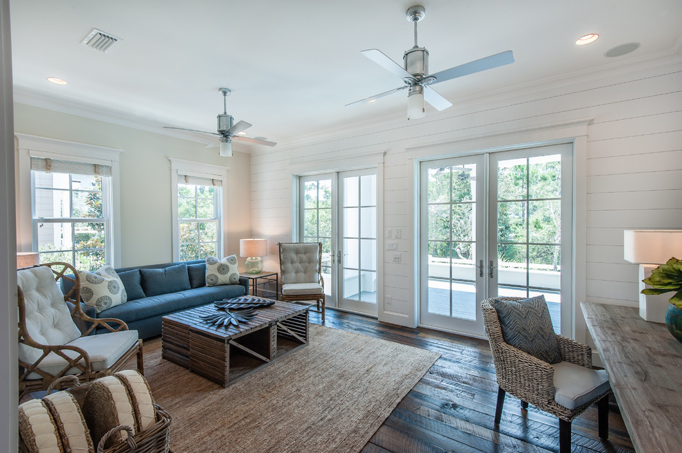 Living room - coastal dark wood floor living room idea in Miami with white walls