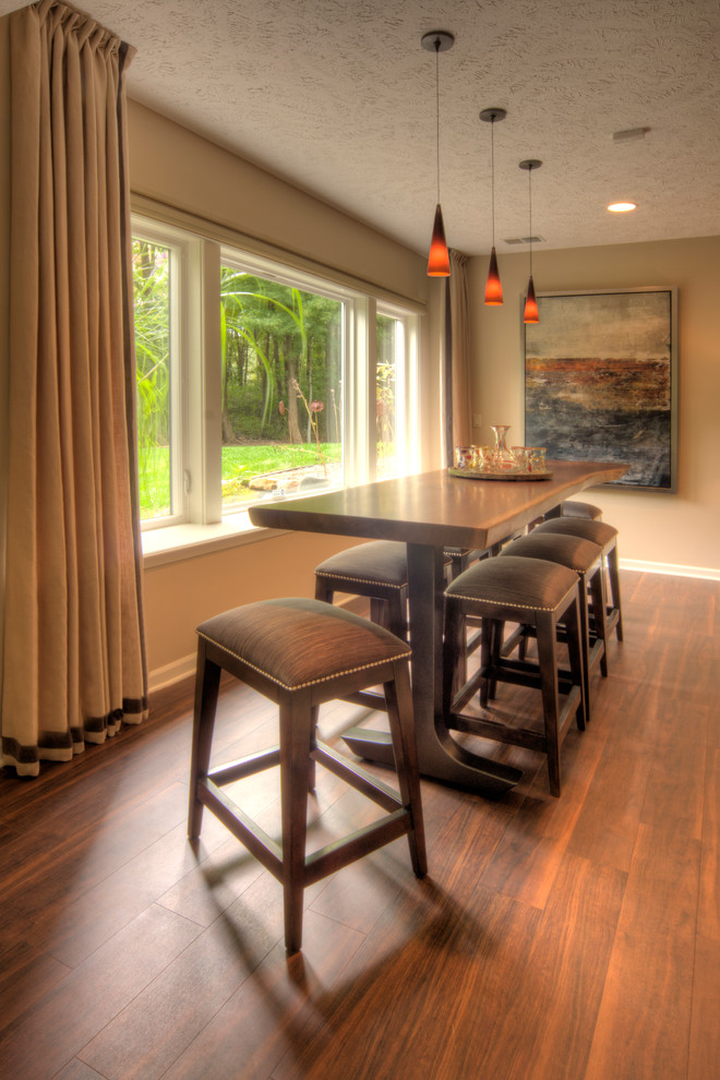 Inspiration for a mid-sized transitional dark wood floor and brown floor kitchen/dining room combo remodel with beige walls and no fireplace