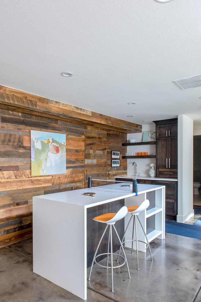 Basement - mid-sized transitional look-out concrete floor and gray floor basement idea in Denver with white walls