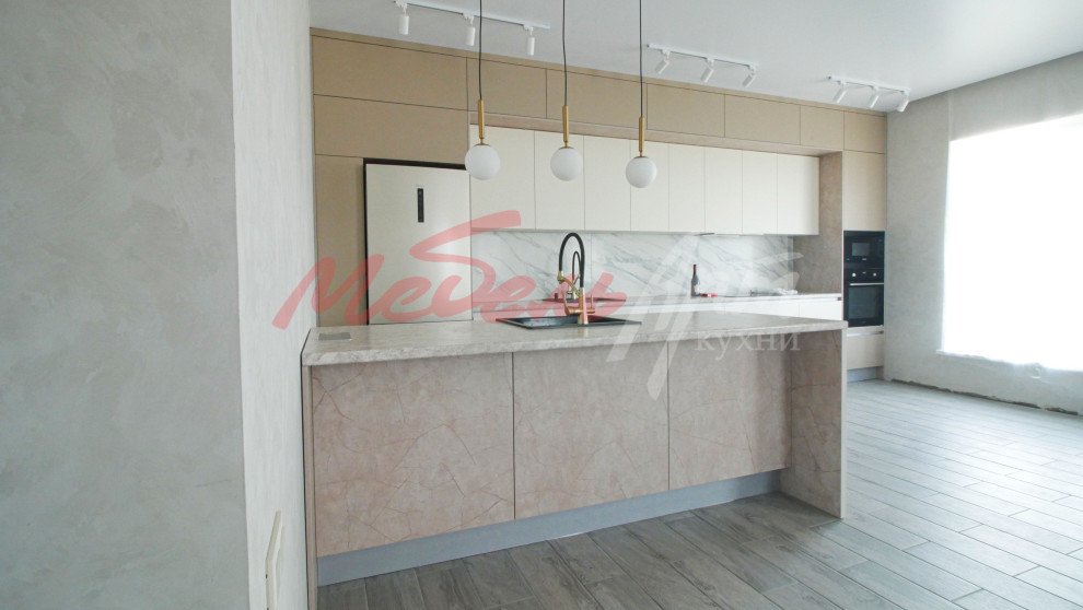 Large contemporary single-wall kitchen/diner in Other with flat-panel cabinets, beige cabinets and an island.