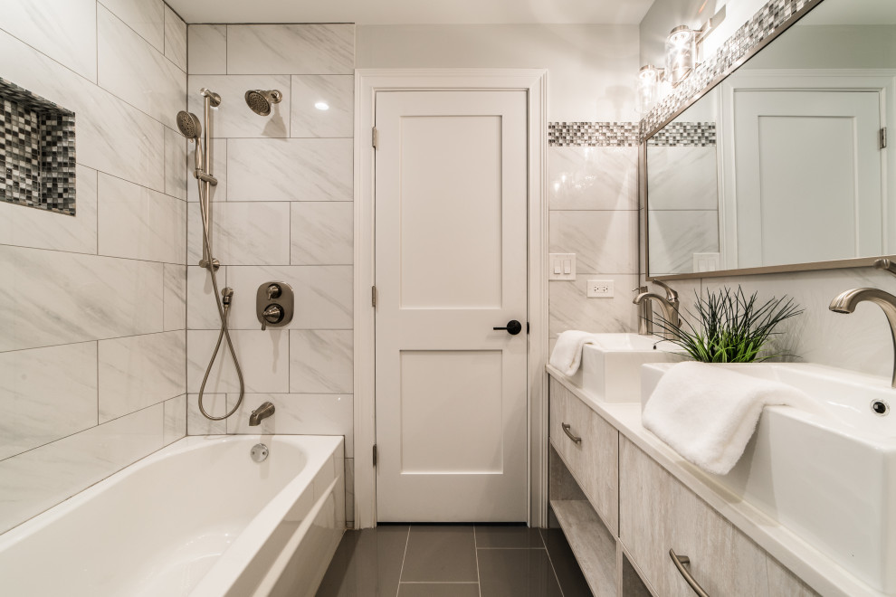 Small contemporary family bathroom in Chicago with light wood cabinets, an alcove bath, a two-piece toilet, grey tiles, mosaic tiles, a vessel sink, engineered stone worktops, white worktops, double sinks and a floating vanity unit.