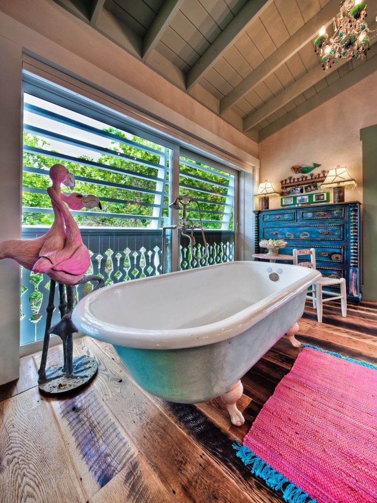 Inspiration for an eclectic bathroom in Tampa with a claw-foot tub.