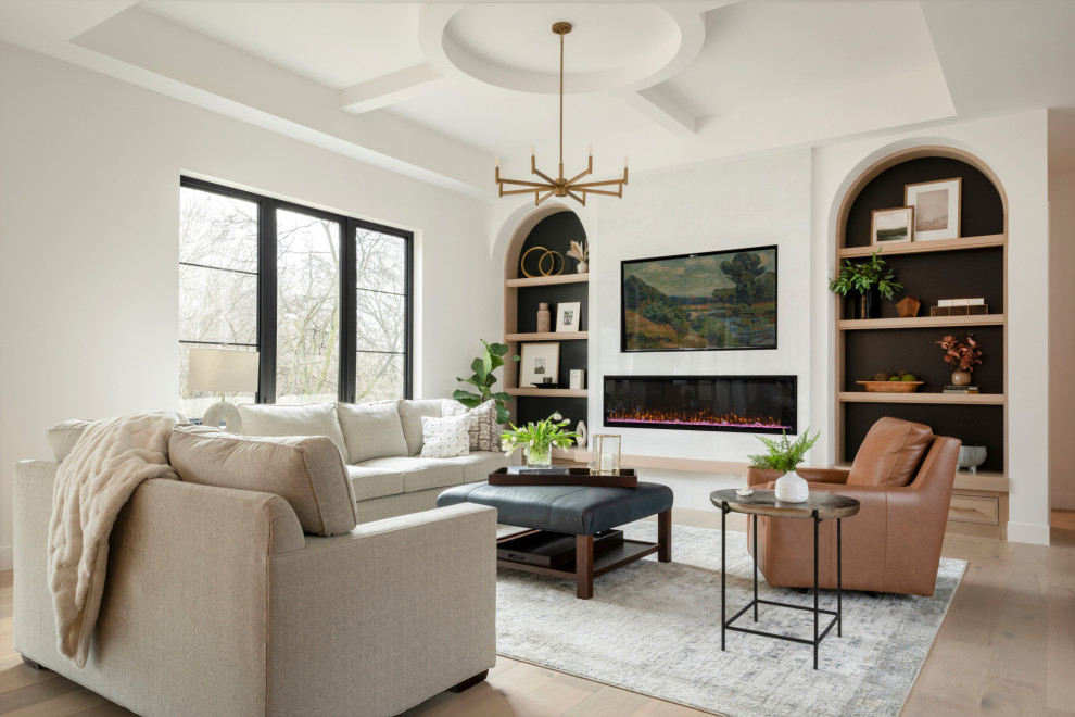 Living room - large transitional open concept light wood floor, beige floor and coffered ceiling living room idea in St Louis with white walls, a ribbon fireplace, a stone fireplace and a wall-mounted tv
