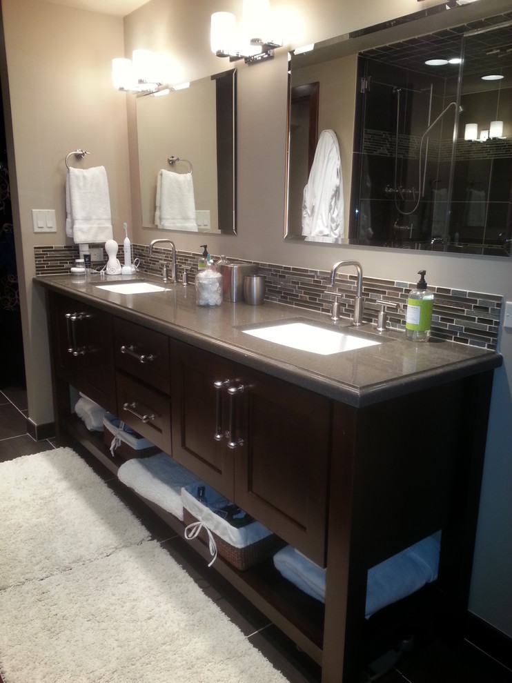 Large scandinavian master bathroom in Salt Lake City with shaker cabinets, dark wood cabinets, beige tile, brown tile, gray tile, matchstick tile, beige walls, ceramic floors, an undermount sink, granite benchtops, an alcove shower, a two-piece toilet and grey benchtops.