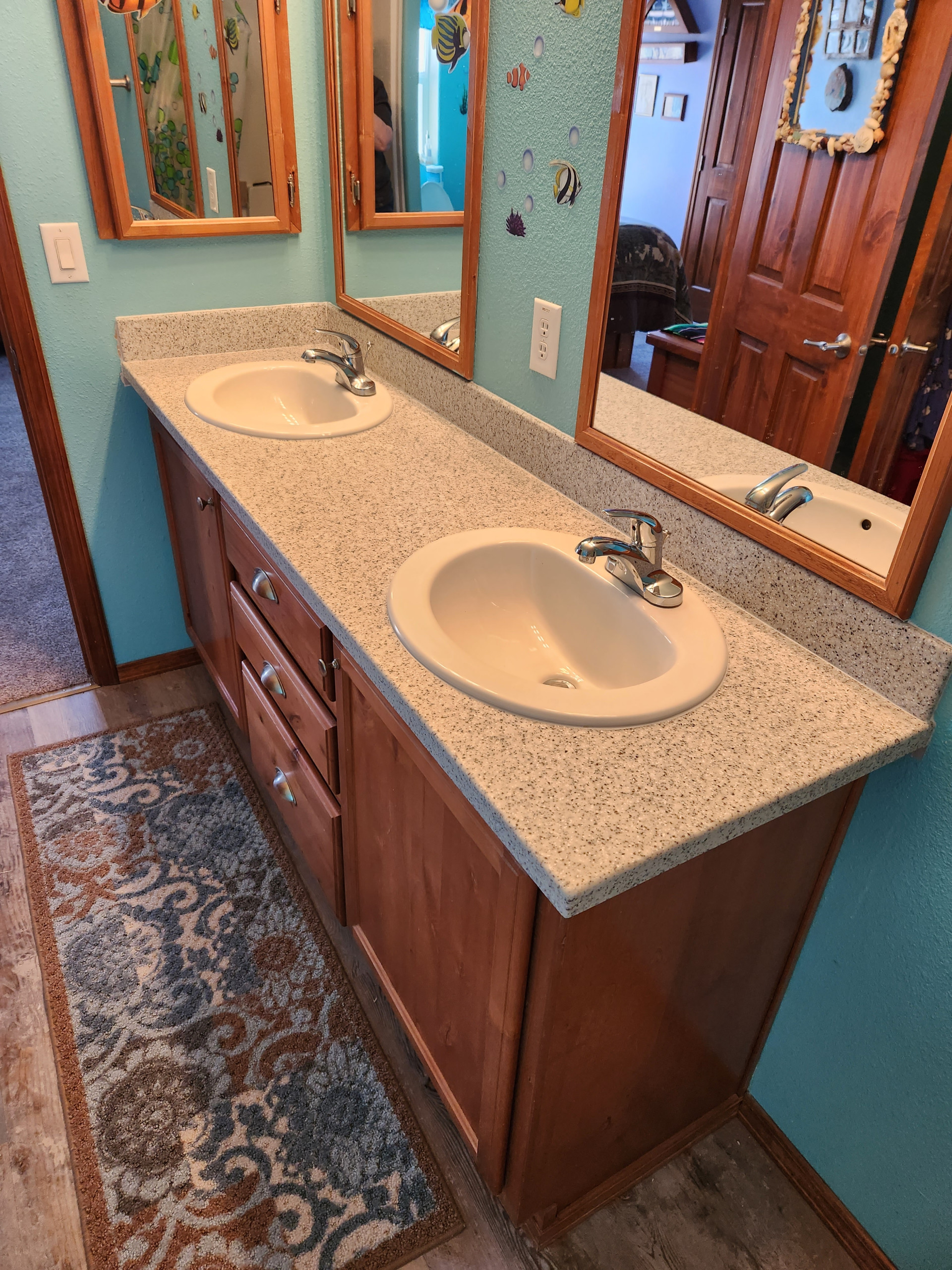 Solid Surface Countertops with All Wood Cabinets