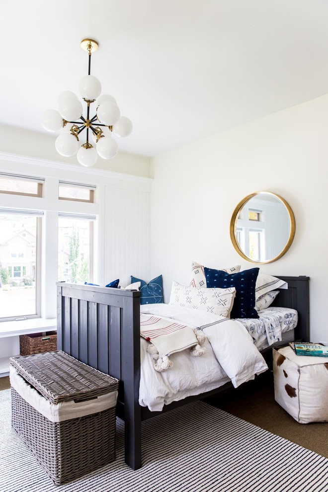 This is an example of a beach style gender-neutral kids' bedroom in Salt Lake City with white walls.