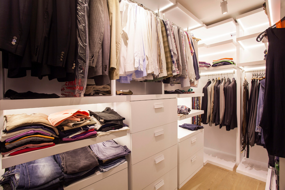 This is an example of a contemporary walk-in wardrobe in Other.